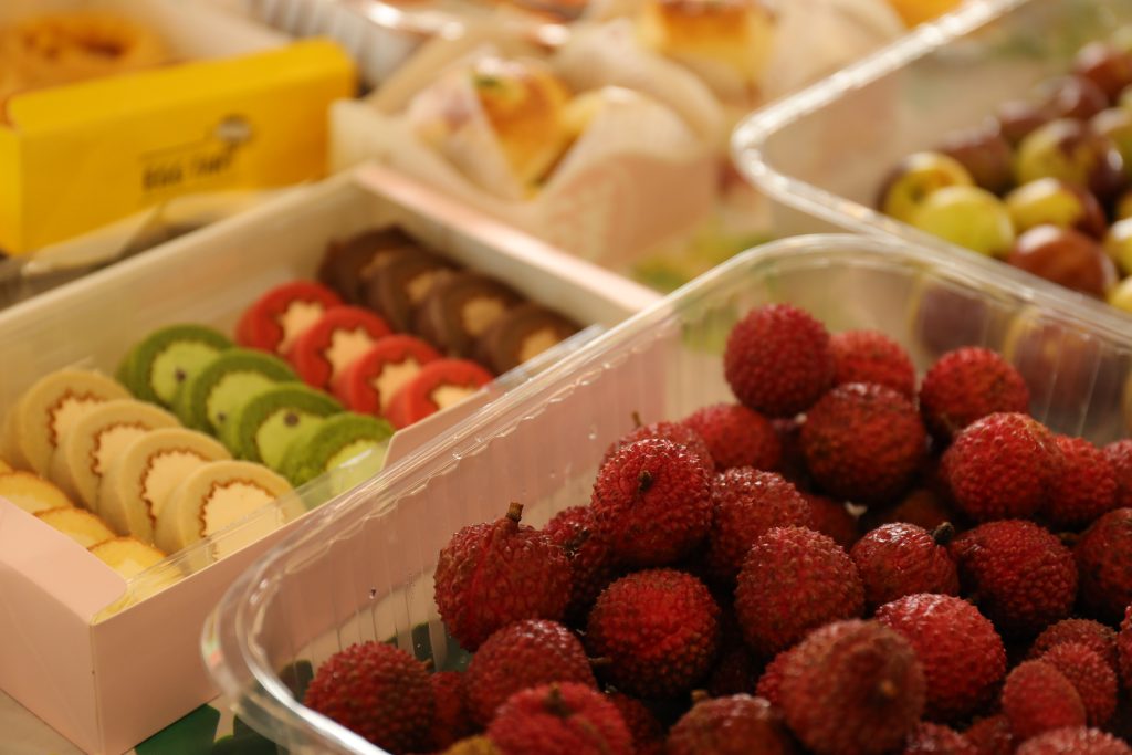 Refreshments at D&J Fashion’s July Birthday Celebration A selection of snacks and fruits laid out at D&J Fashion’s July birthday celebration, enjoyed by the team.