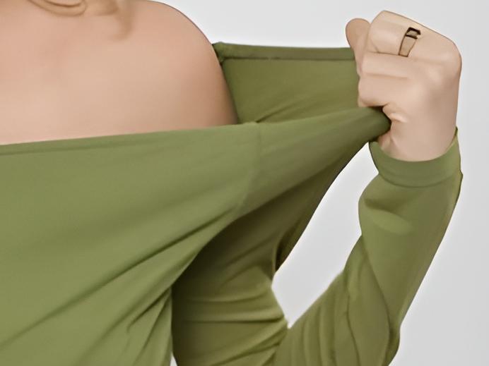 Model stretching bamboo viscose fabric by D&J Fashion, highlighting sustainable fabrics, OEM, and ODM expertise in women’s apparel