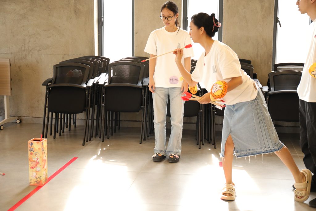 Team-building Activities at D&J Fashion D&J Fashion employees engaging in team-building games